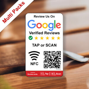 A small card sits on a wooden surface, displaying "Review Us On Google Verified Reviews" with a 5-star rating. It has "TAP or SCAN" with NFC and QR code symbols, and branding from Review.cards. A red diagonal banner reads "Multi Packs" in the top left corner, showcasing it as a Google Smart Review Card Multi Packs - Free Delivery.